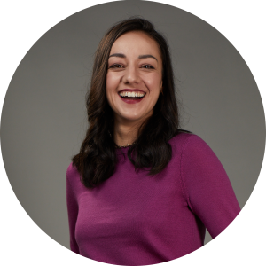 Smiling woman in a grey circle